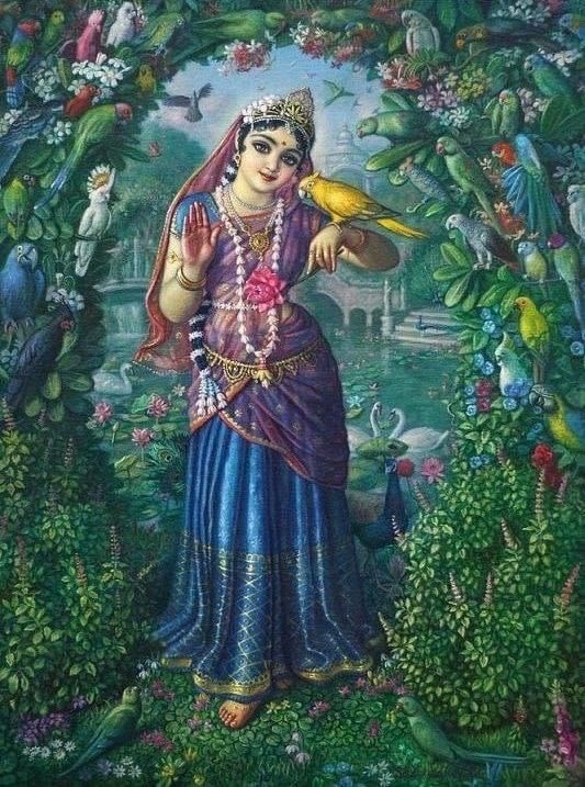 Radha Rani in peacock blue attire